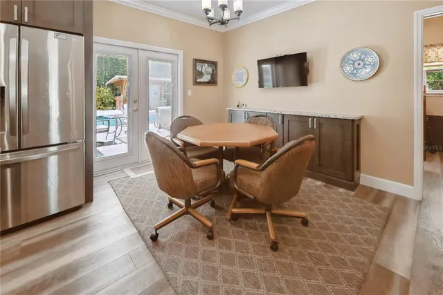 a bathroom with a toilet sink and shower curtain