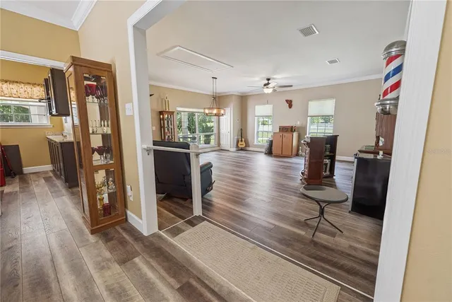 a bed room with a bed and a chandelier