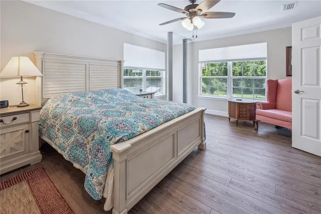 a view of a house with porch and garden