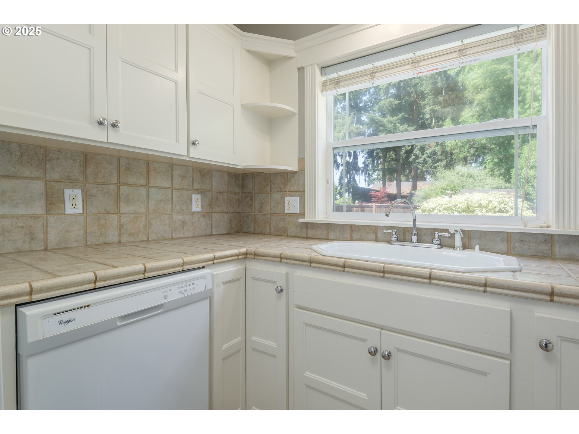 1507 Bogart Lane Eugene, OR 97401 - Photo 12 of 41 a kitchen with a sink and cabinets