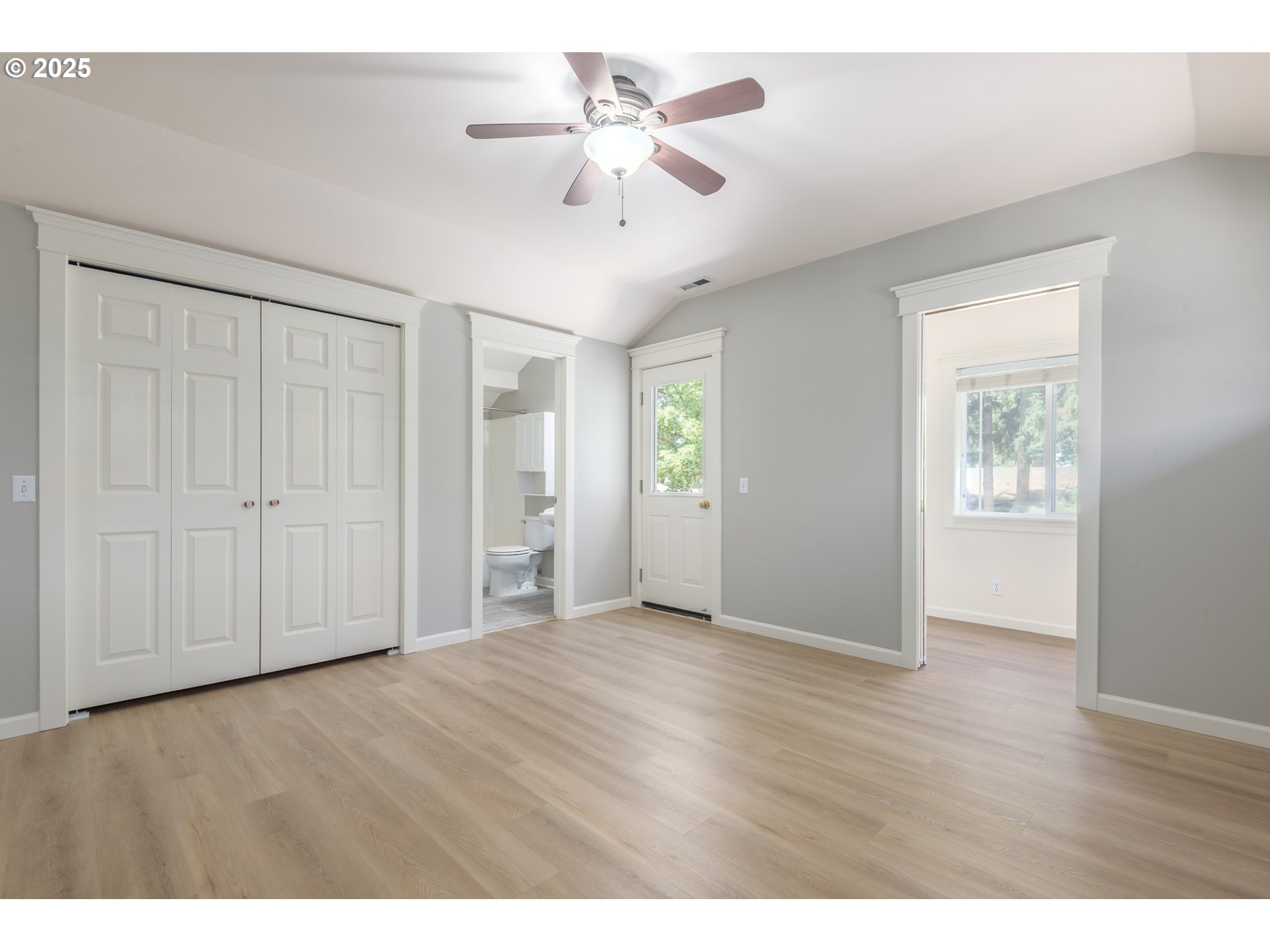 1507 Bogart Lane Eugene, OR 97401 - Photo 16 of 41 a view of an empty room with a ceiling fan