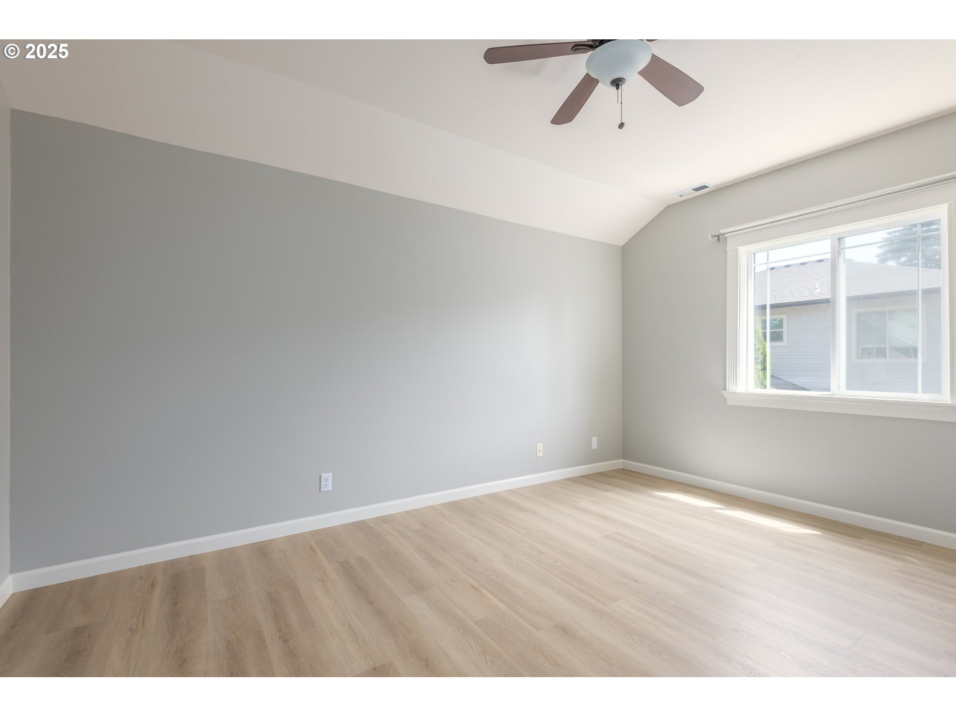 1507 Bogart Lane Eugene, OR 97401 - Photo 20 of 41 a view of an empty room with a window