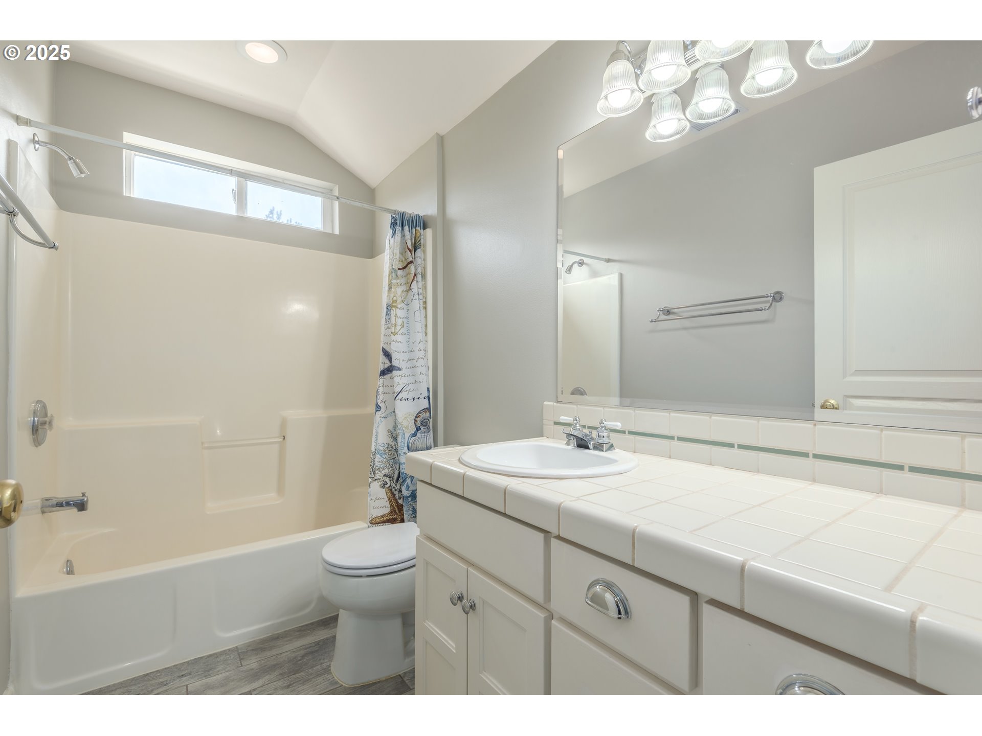 1507 Bogart Lane Eugene, OR 97401 - Photo 28 of 41 a bathroom with a sink a toilet and shower
