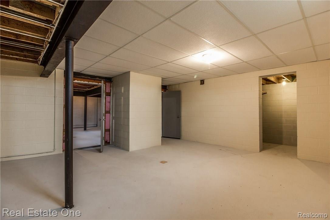 14484 Imlay City Road Capac, MI 48014 - Photo 29 of 39 Newer Basement foundation with tall ceilings