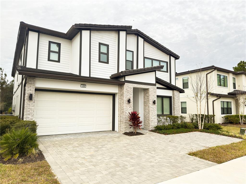 1250 Butterfly Orchid Road Davenport, FL 33837 - Photo 2 of 56