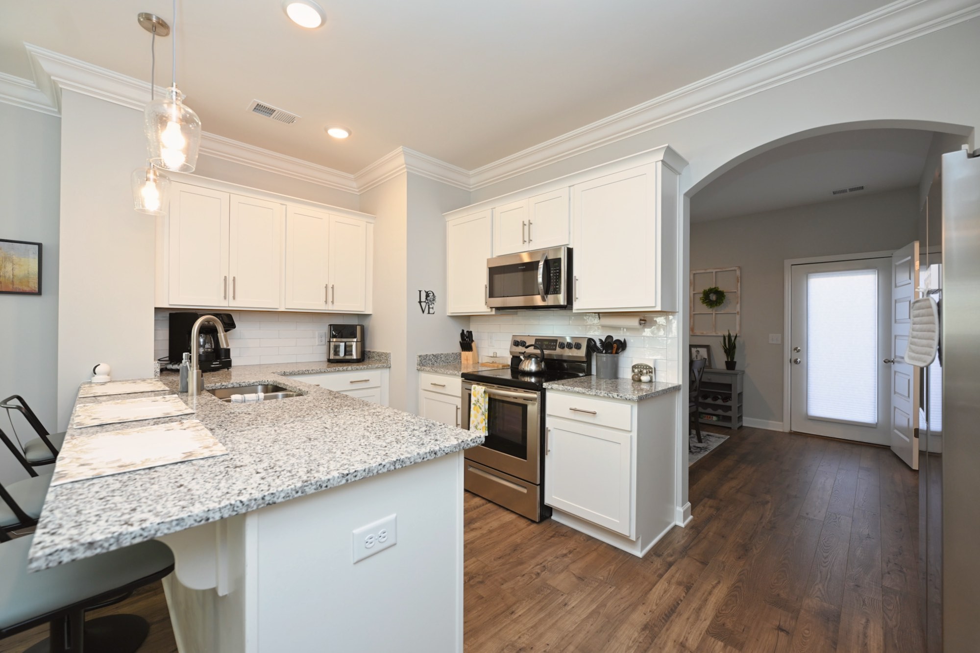436 Withrow Way Gallatin, TN 37066 - Photo 14 of 41 a kitchen with a sink a counter top space appliances and cabinets