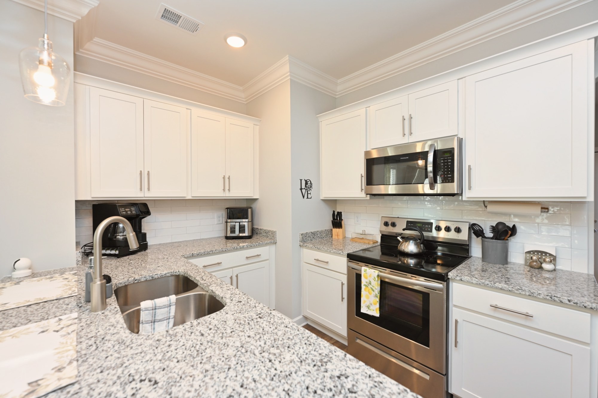 436 Withrow Way Gallatin, TN 37066 - Photo 17 of 41 a kitchen with a sink stove and microwave