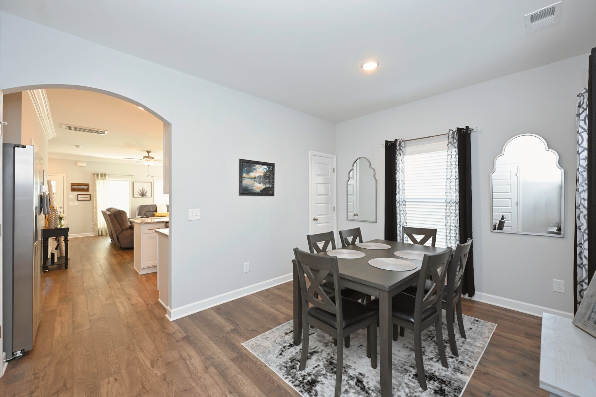 436 Withrow Way Gallatin, TN 37066 - Photo 18 of 41 a view of a dining room with furniture and wooden floor