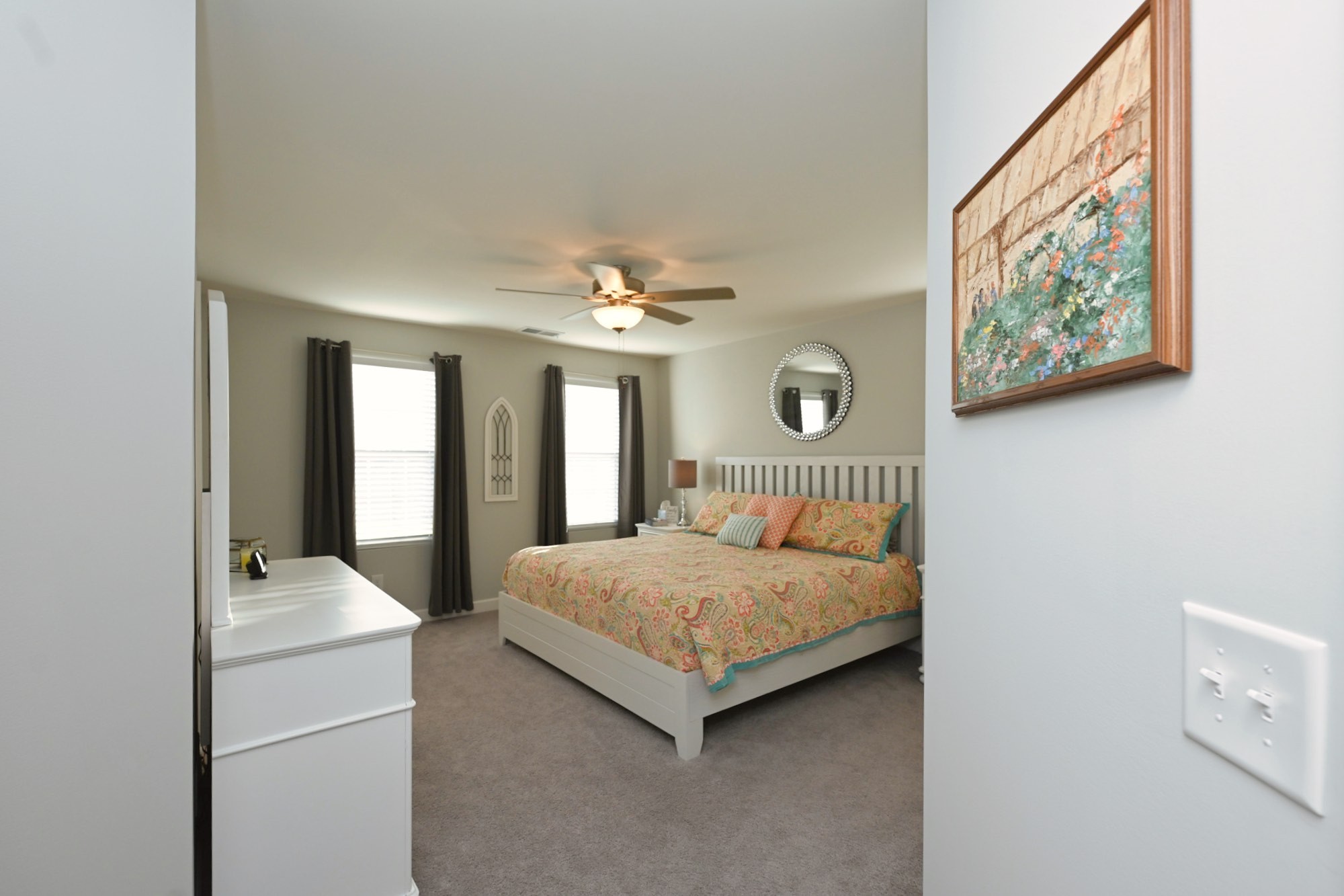 436 Withrow Way Gallatin, TN 37066 - Photo 23 of 41 a bedroom with a large bed and a chandelier