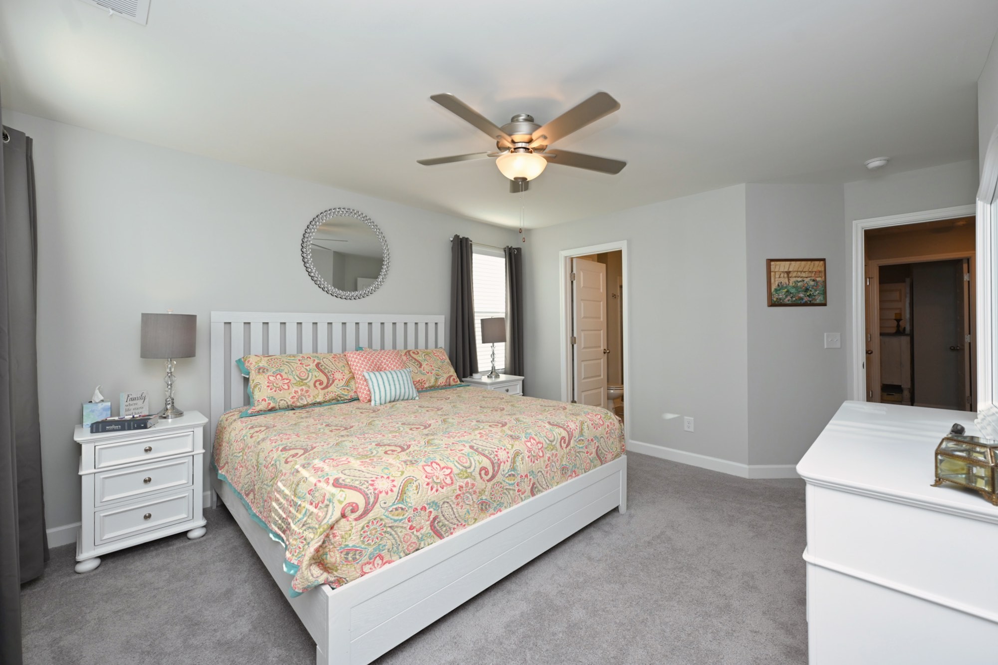 436 Withrow Way Gallatin, TN 37066 - Photo 24 of 41 a bedroom with a bed and a chandelier