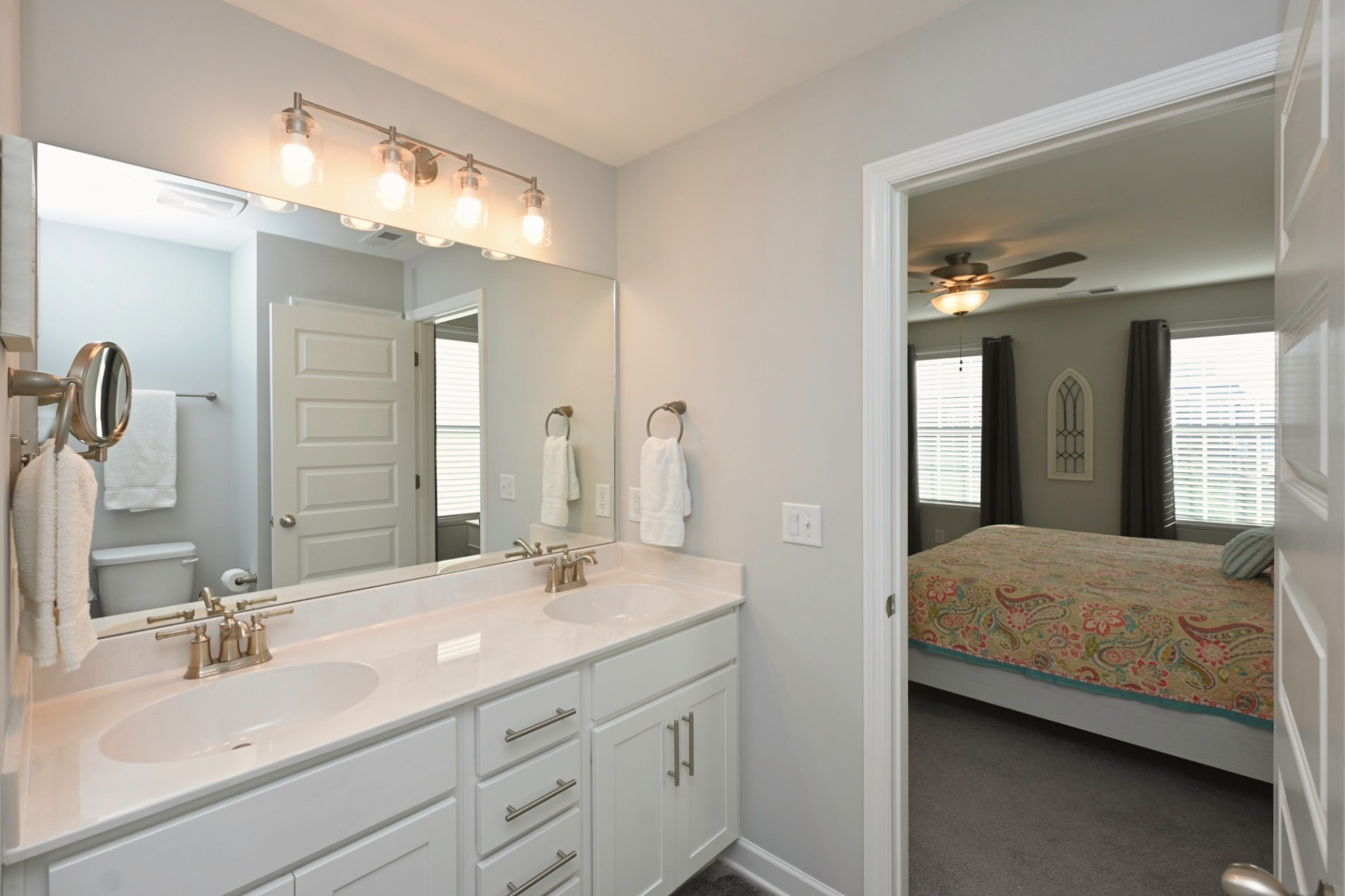 436 Withrow Way Gallatin, TN 37066 - Photo 28 of 41 a en suite bathroom with a double vanity sink and a mirror
