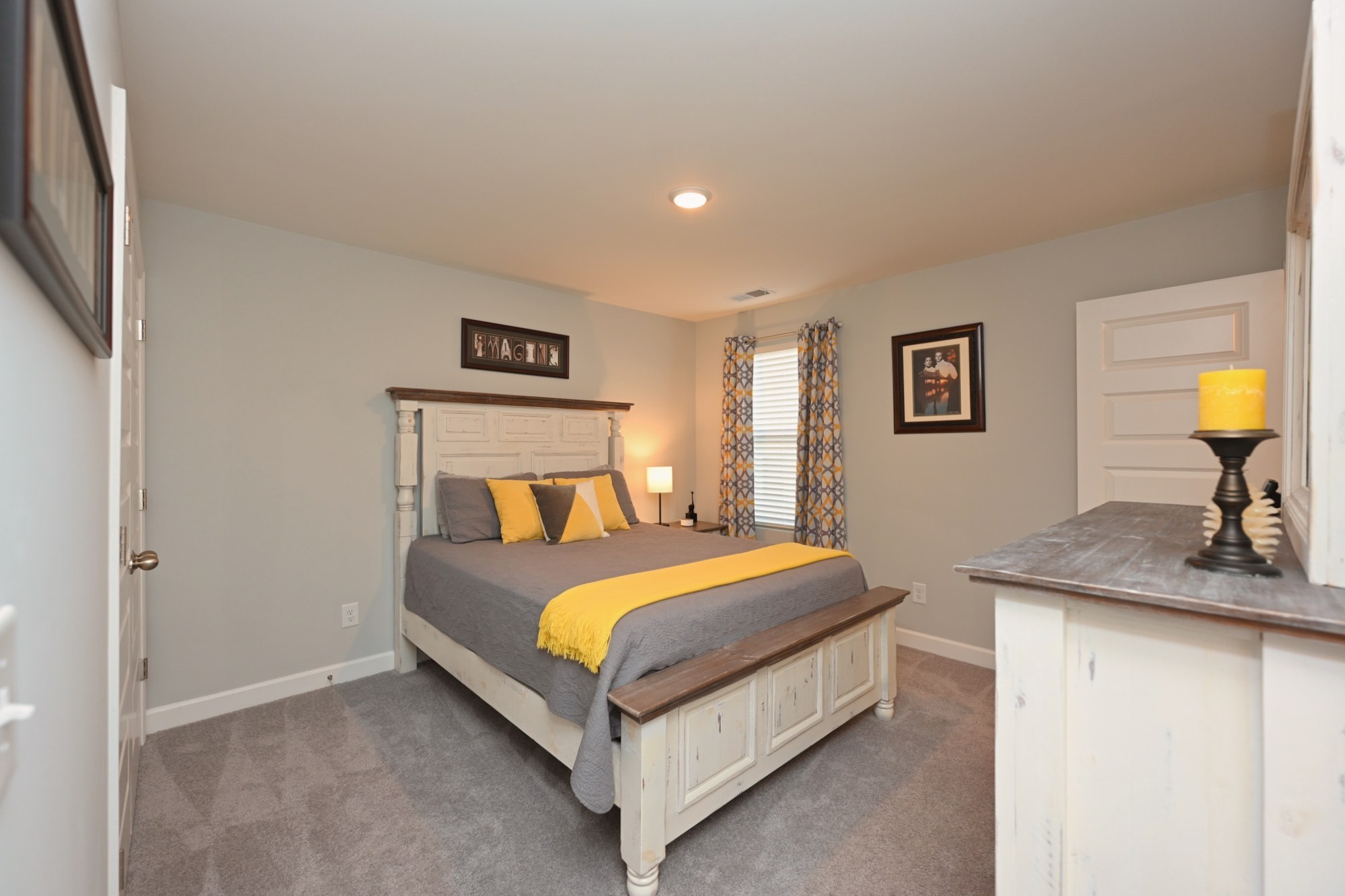436 Withrow Way Gallatin, TN 37066 - Photo 30 of 41 a bedroom with a bed and a lamp on table