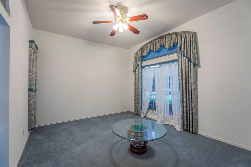 8317 Lake Bend Drive Rowlett, TX 75088 - Photo 6 of 35 2nd view of living room, carpet and ceiling fan