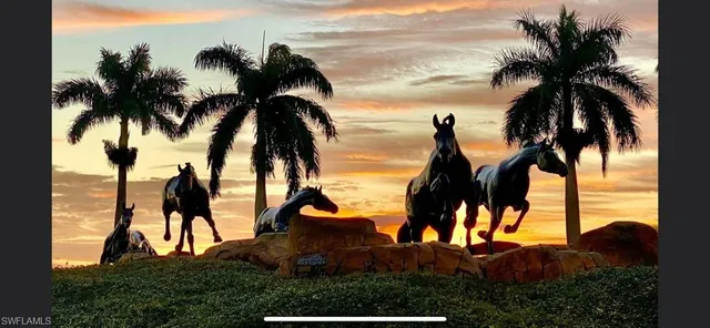 an ocean view with palm trees