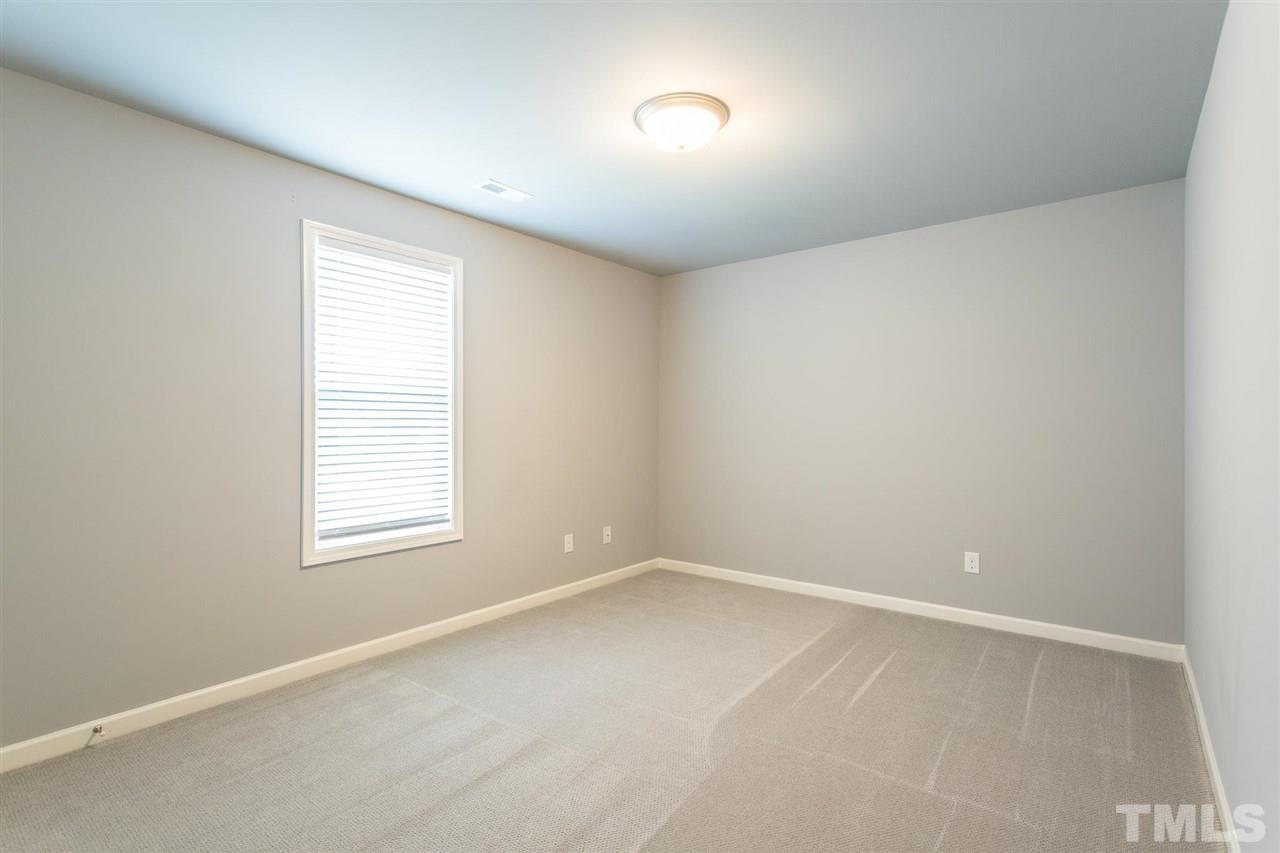 112 Willow Ridge Circle Willow Spring, NC 27592 - Photo 26 of 30 an empty room with a window