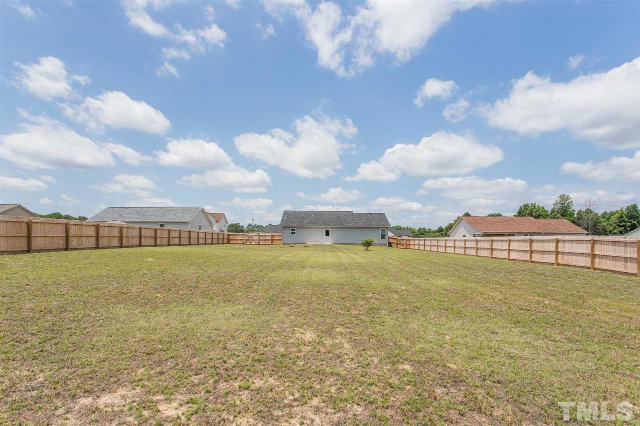 112 Willow Ridge Circle Willow Spring, NC 27592 - Photo 5 of 30 a view of a lake
