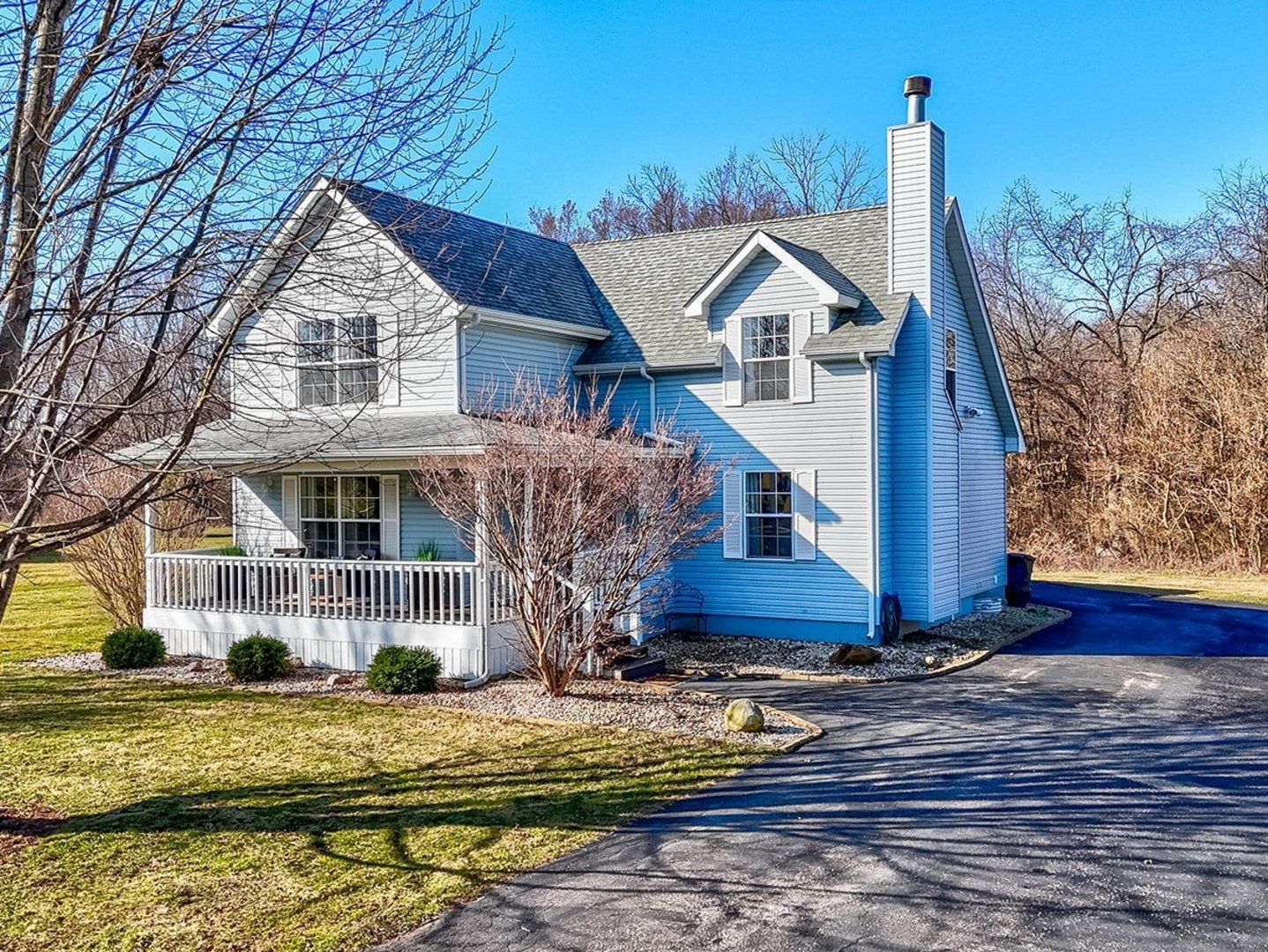 710 Daisy Court Seneca, IL 61360 - Photo 1 of 38 a front view of a house with garden