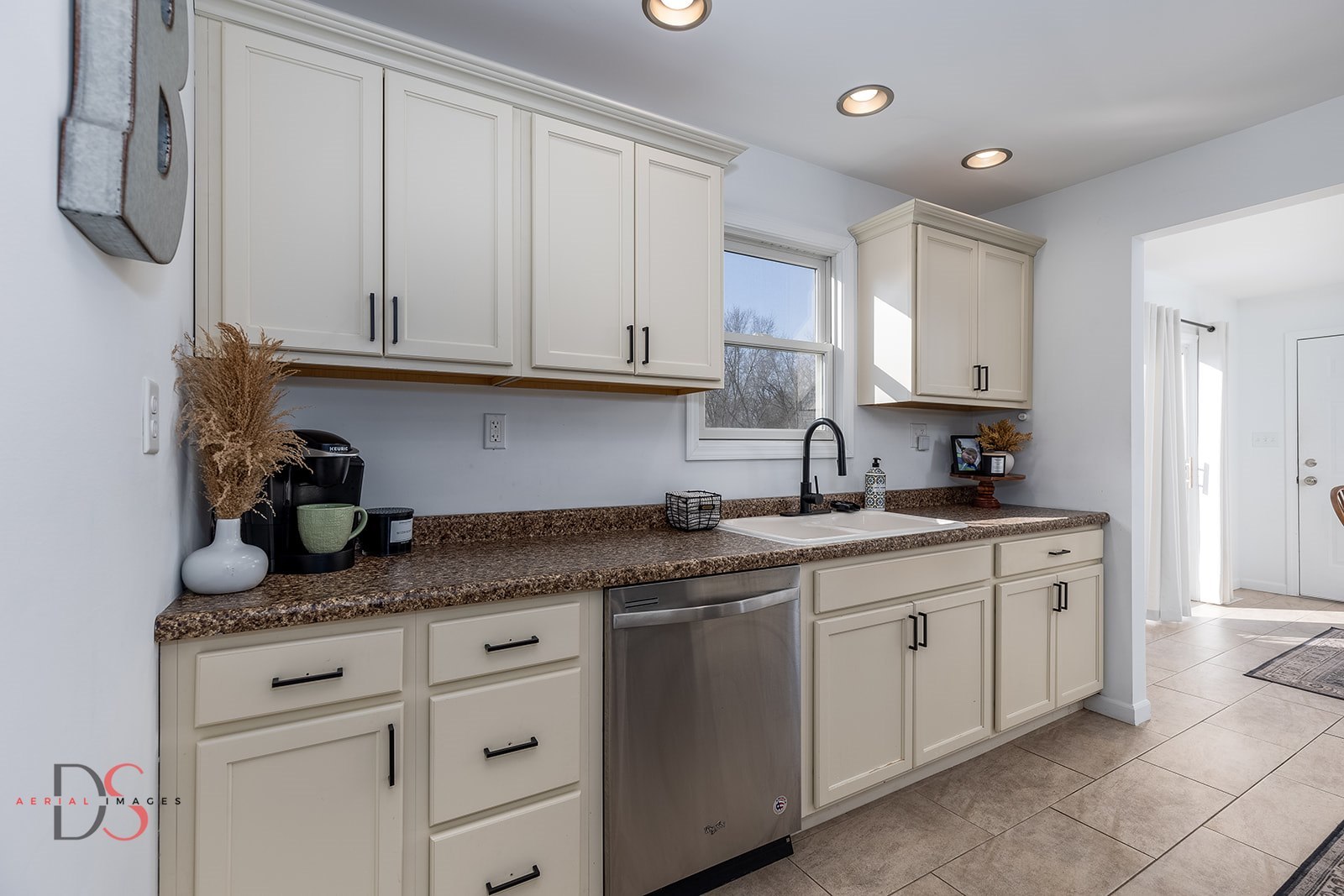 710 Daisy Court Seneca, IL 61360 - Photo 13 of 38 a kitchen with stainless steel appliances granite countertop a sink and cabinets