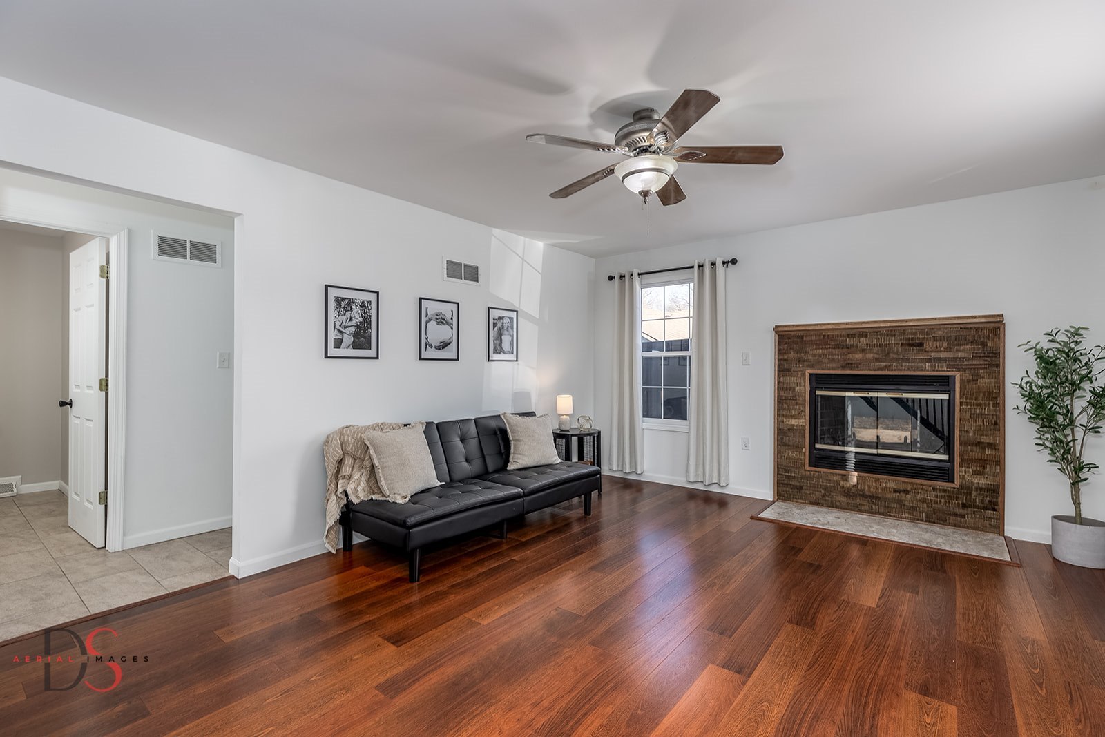 710 Daisy Court Seneca, IL 61360 - Photo 17 of 38 a living room with furniture and a fireplace