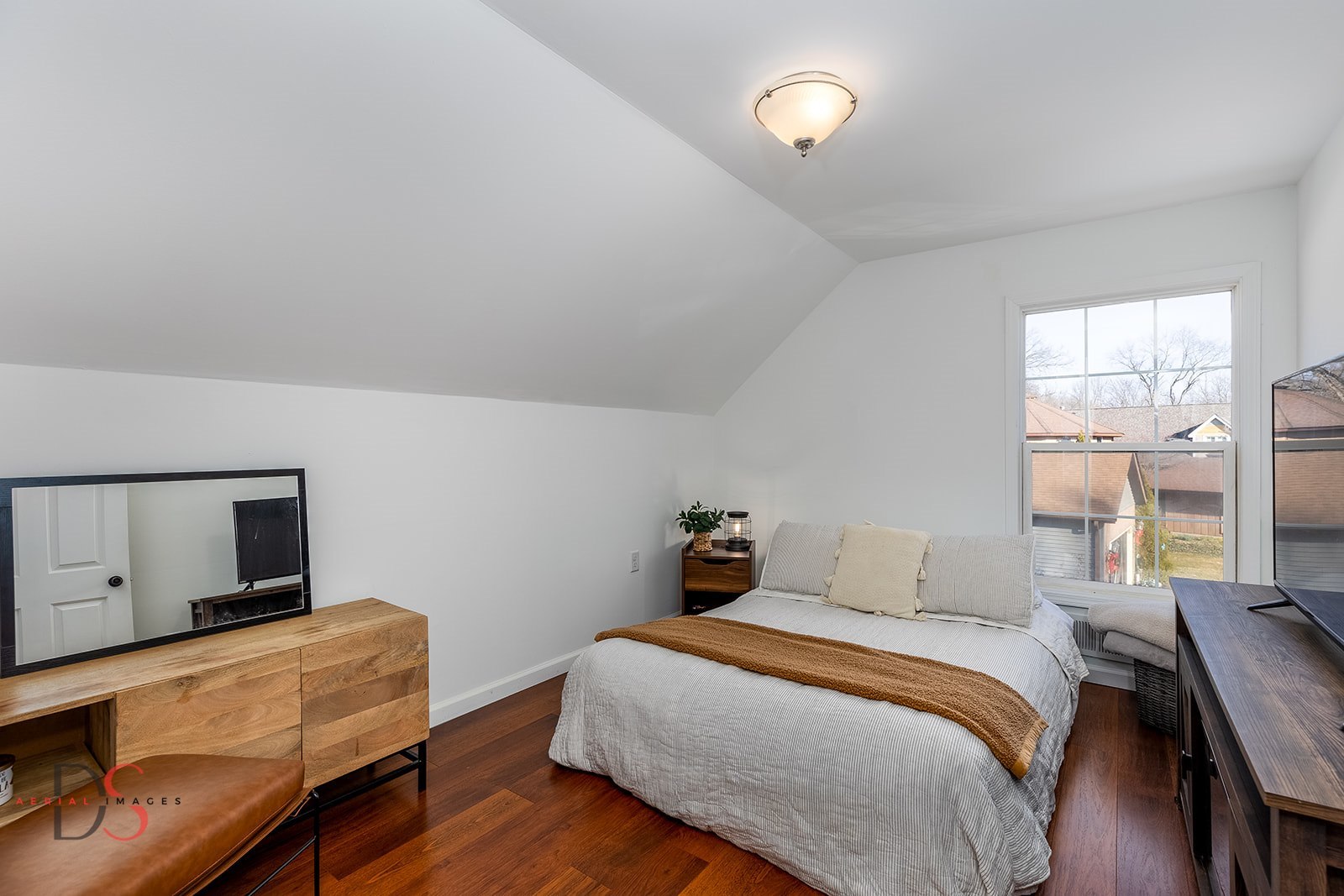 710 Daisy Court Seneca, IL 61360 - Photo 24 of 38 a bedroom with a bed and wooden floor