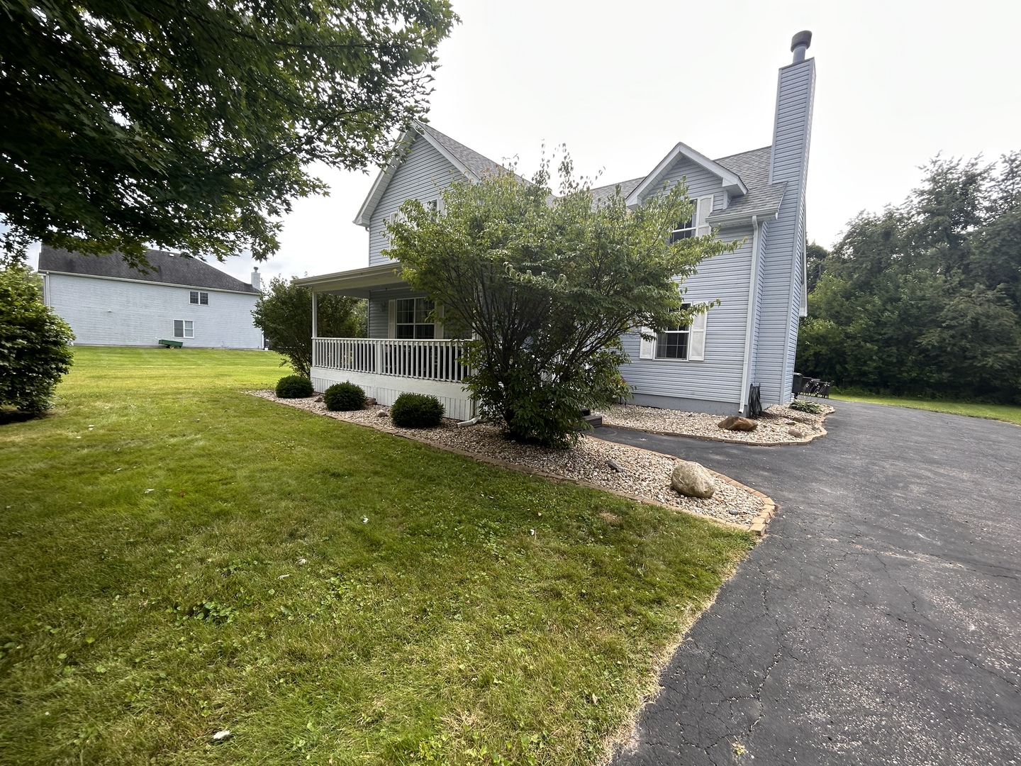 710 Daisy Court Seneca, IL 61360 - Photo 3 of 38 a view of a house with backyard and garden