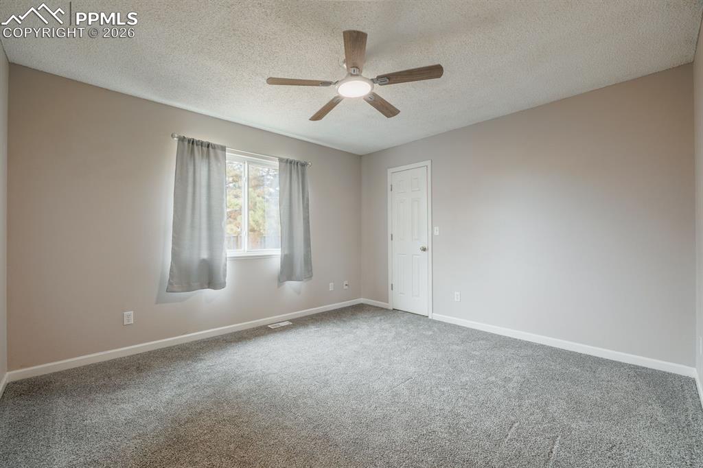 739 Memory Lane Fountain, CO 80817 - Photo 12 of 37 a view of an empty room with a window