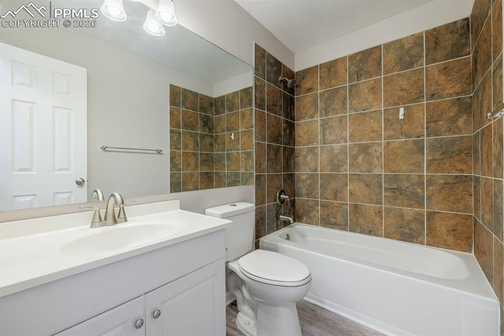 739 Memory Lane Fountain, CO 80817 - Photo 16 of 37 a bathroom with a sink a toilet and bathtub