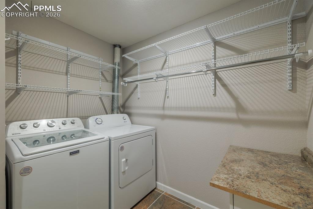 739 Memory Lane Fountain, CO 80817 - Photo 22 of 37 a utility room with dryer and washer