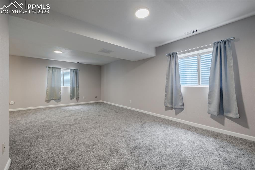 739 Memory Lane Fountain, CO 80817 - Photo 26 of 37 an empty room with windows