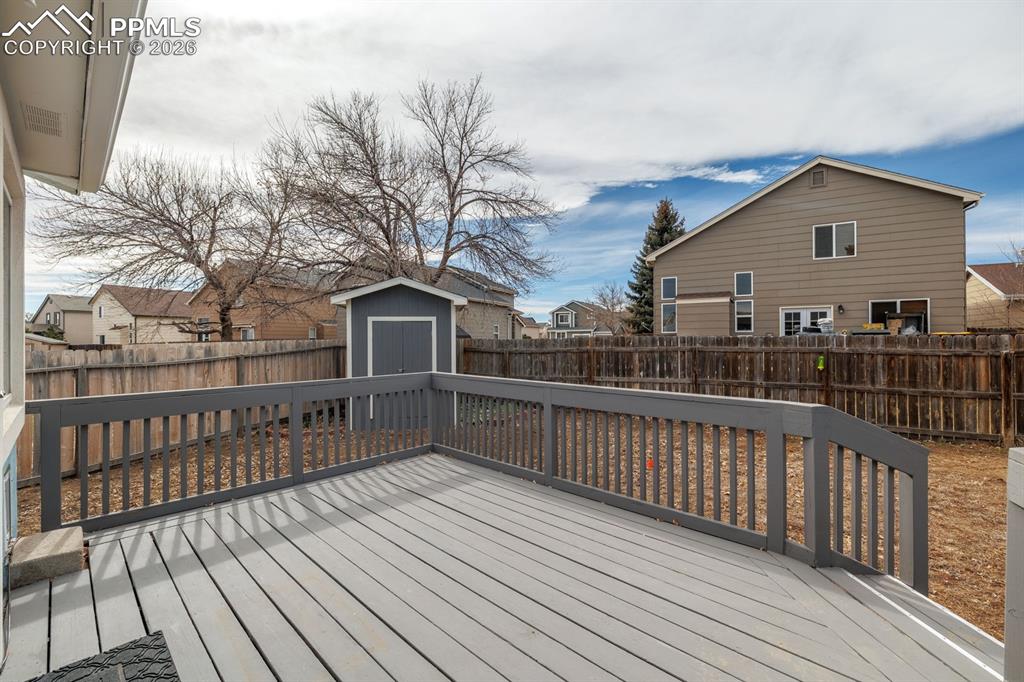 739 Memory Lane Fountain, CO 80817 - Photo 28 of 37 a view of balcony with wooden floor and fence