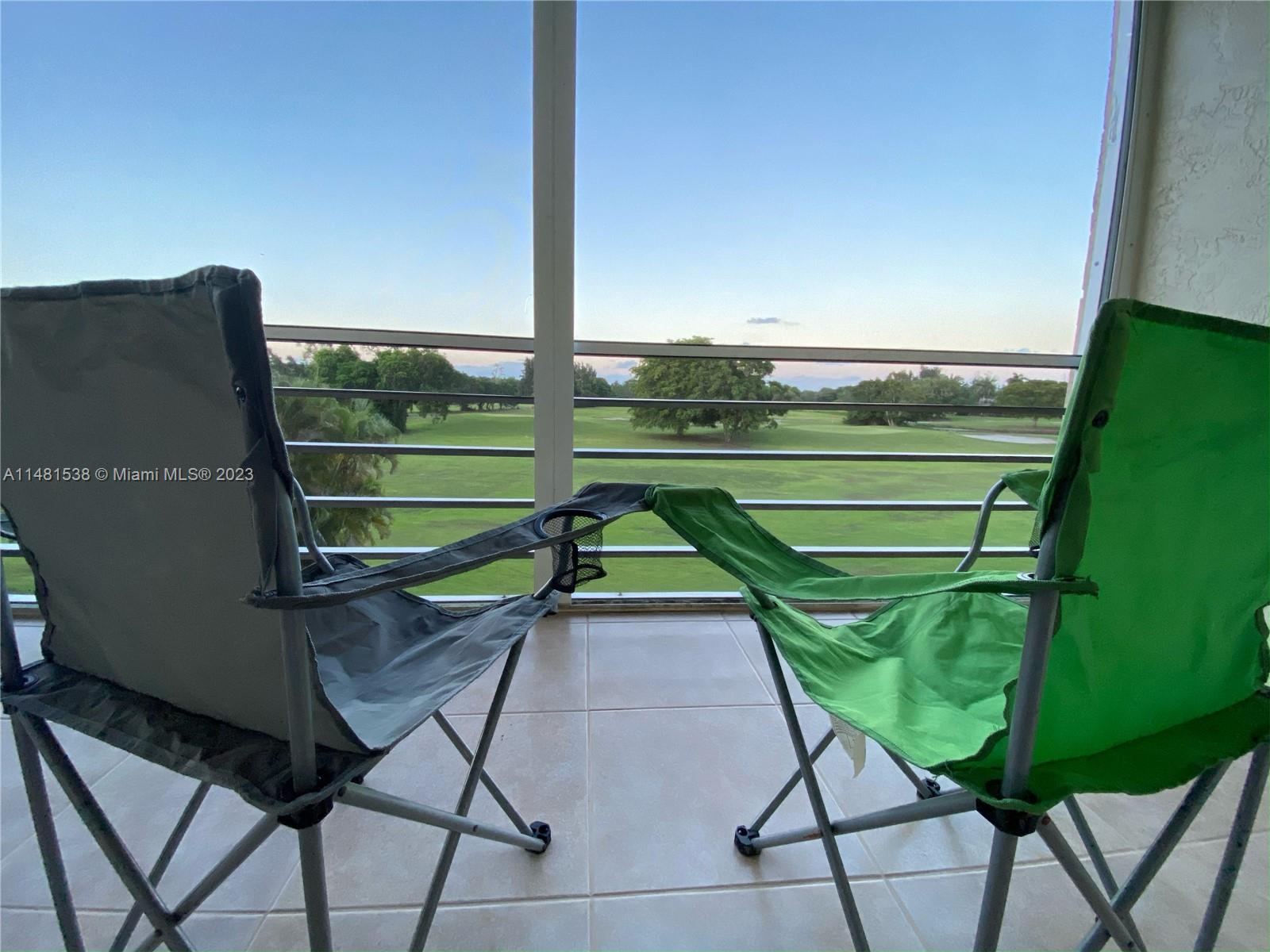 5100 Southwest 90th Avenue, Unit 303 Cooper City, FL 33328 - Photo 12 of 36 a view of an outdoor sitting space