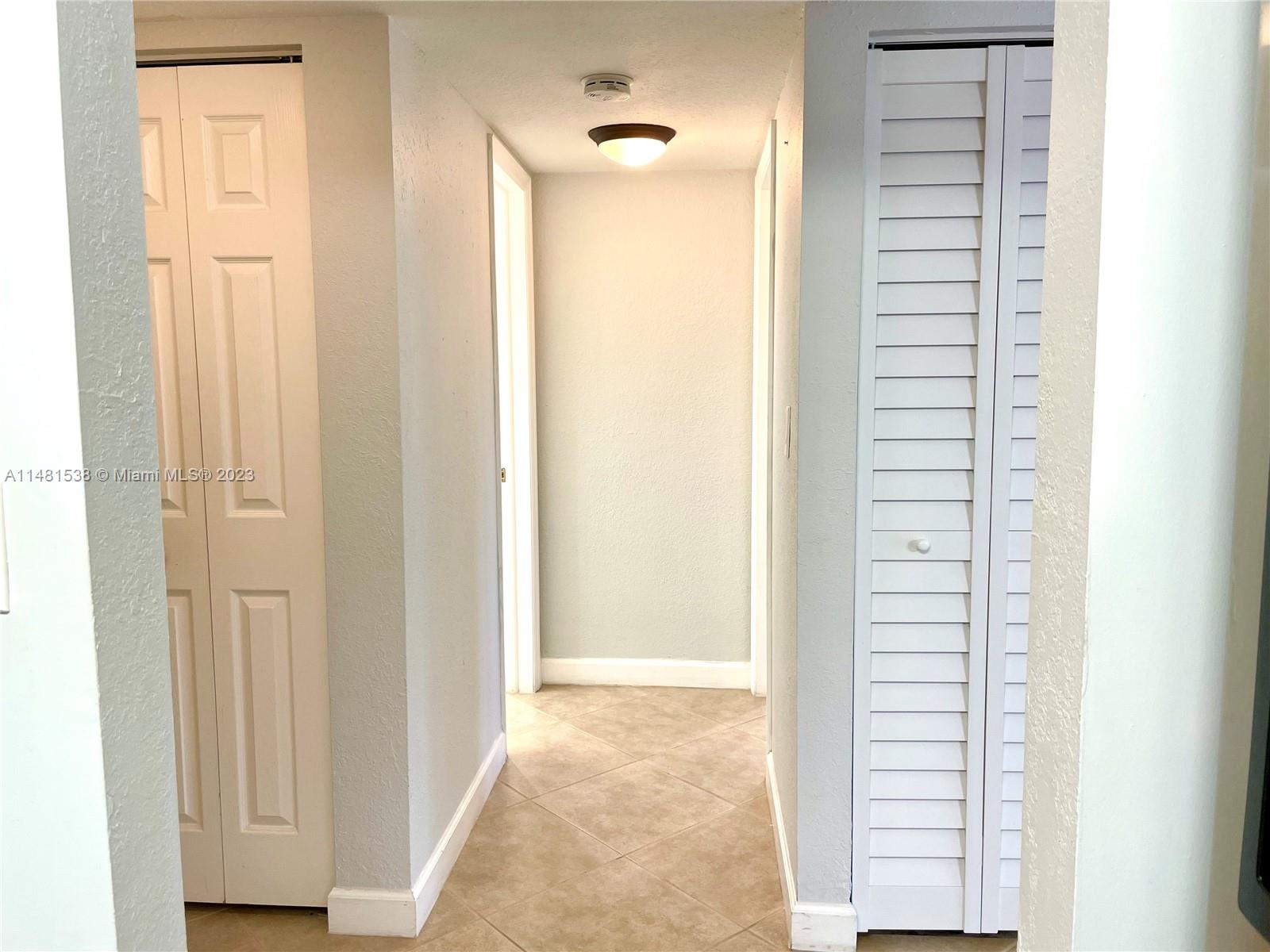 5100 Southwest 90th Avenue, Unit 303 Cooper City, FL 33328 - Photo 16 of 36 a view of a bathroom with a shower