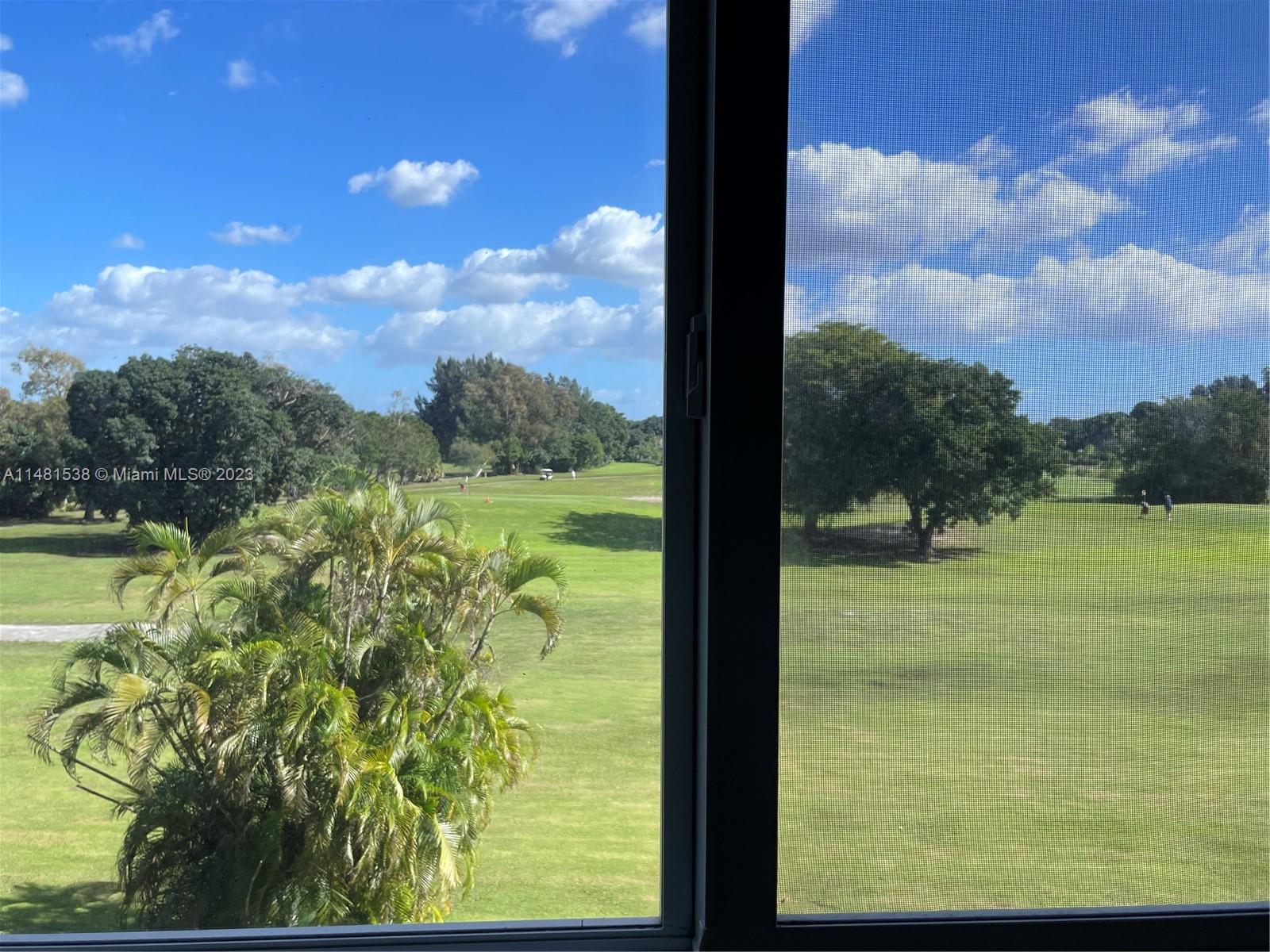 5100 Southwest 90th Avenue, Unit 303 Cooper City, FL 33328 - Photo 35 of 36 a view of a lake from a window