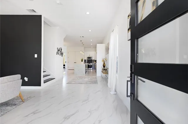 a picture of houses with outdoor space and seating area