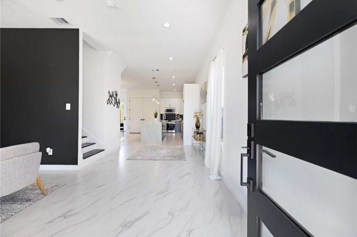 8414 Cannon Street, Unit B Houston, TX 77051 - Photo 4 of 7 a view of a kitchen with a refrigerator and a cabinets