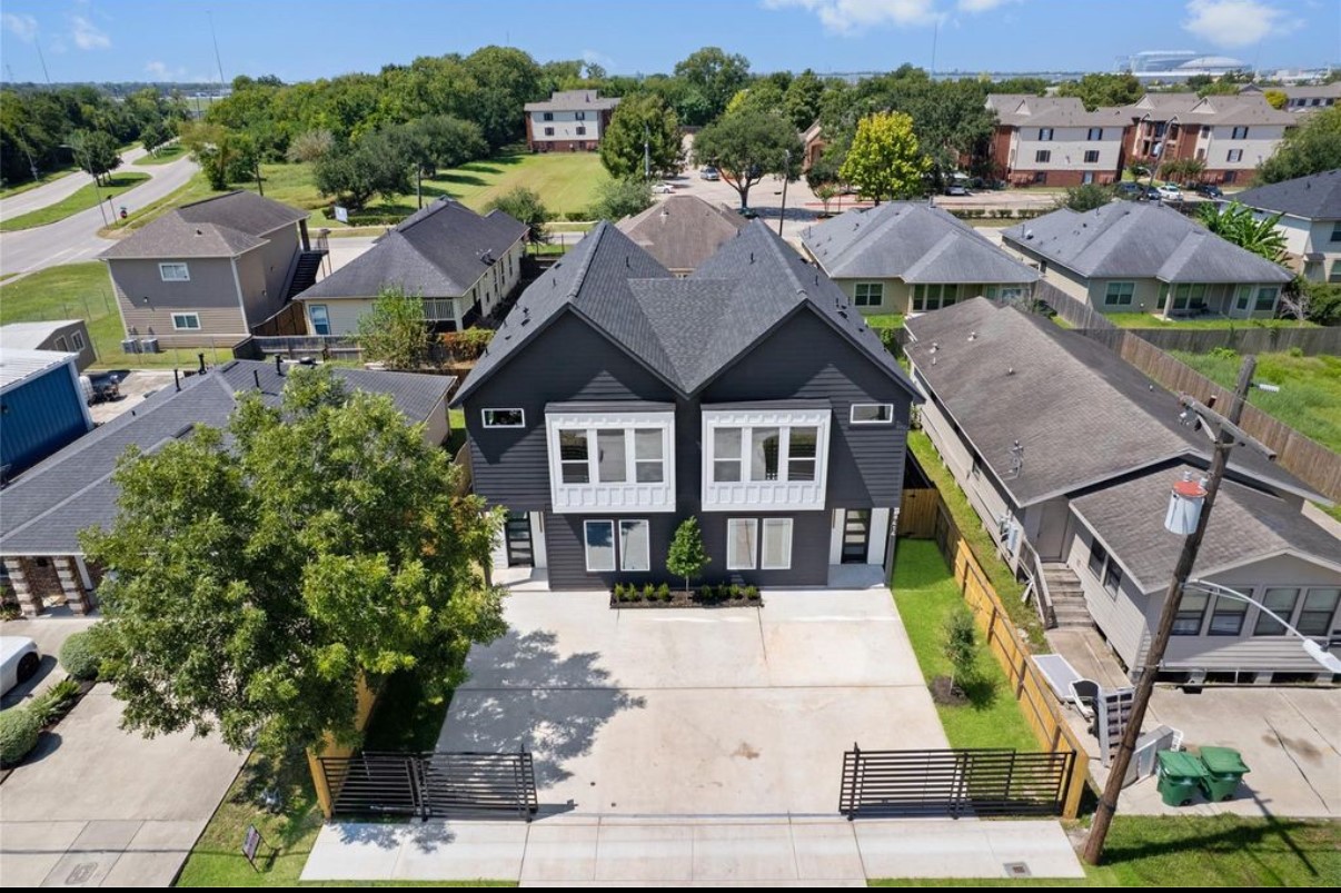 8414 Cannon Street, Unit B Houston, TX 77051 - Photo 5 of 7 a picture of houses with outdoor space and seating area