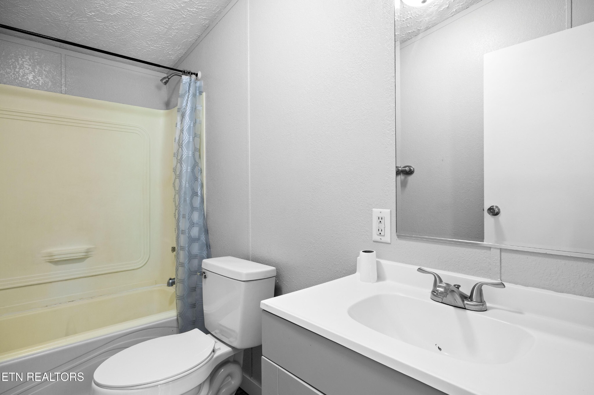 1768 Fain Cemetery Road Dandridge, TN 37725 - Photo 21 of 45 a bathroom with a sink toilet and shower