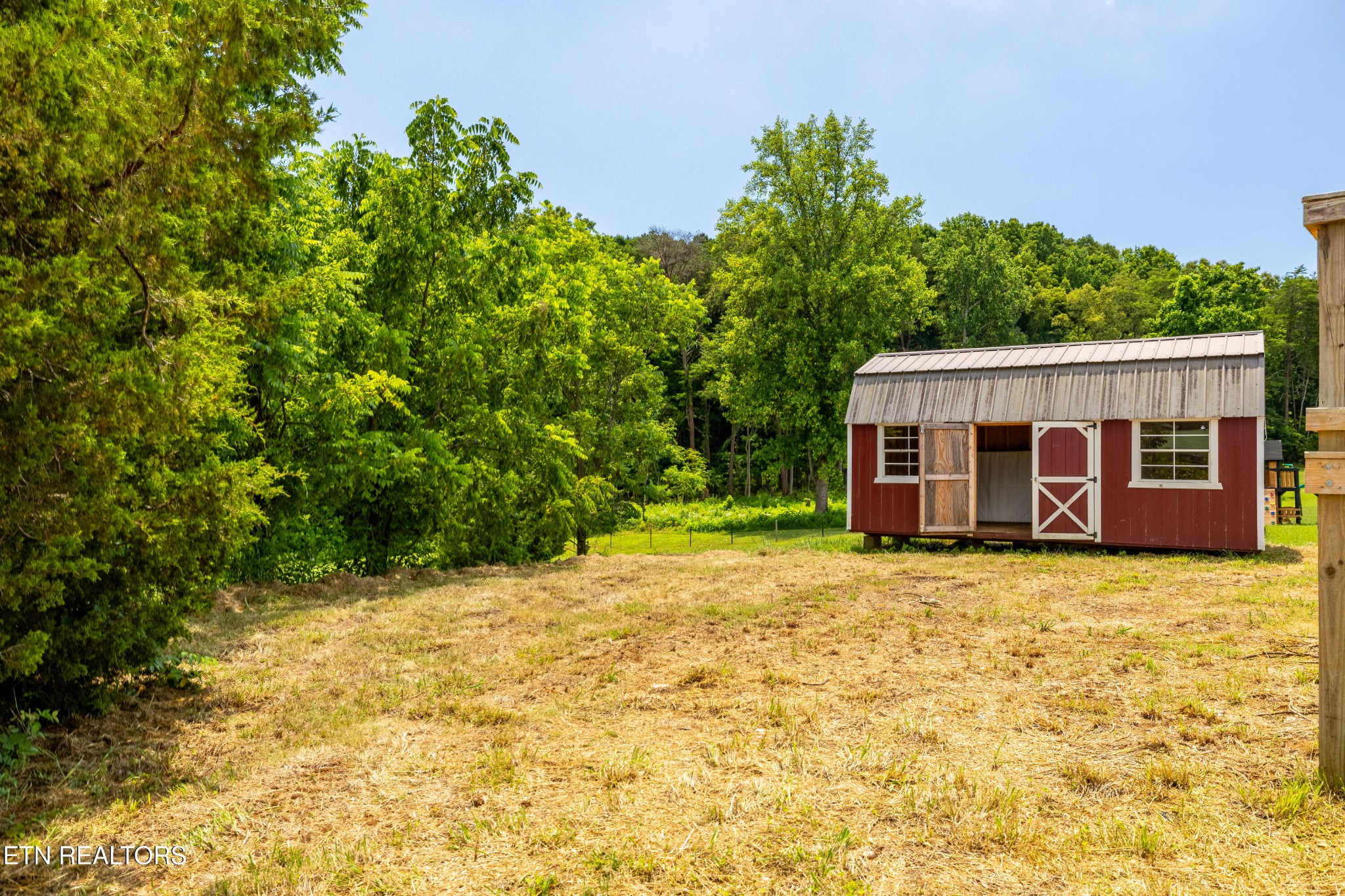 1768 Fain Cemetery Road Dandridge, TN 37725 - Photo 24 of 45 a view of a house with a yard