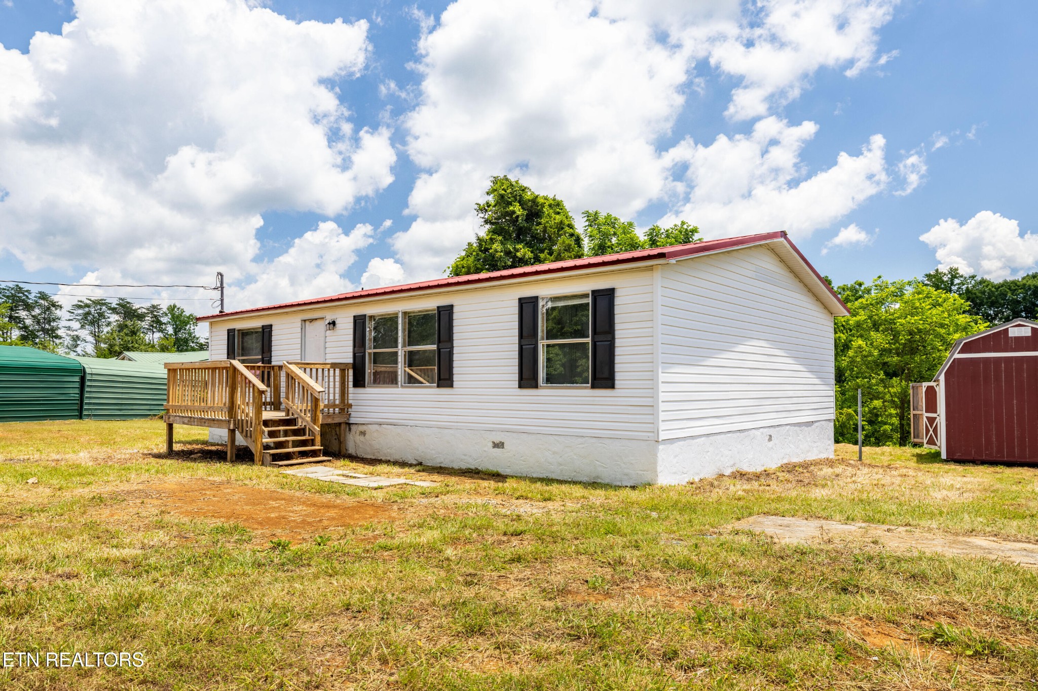 1768 Fain Cemetery Road Dandridge, TN 37725 - Photo 3 of 45 a view of a house with backyard