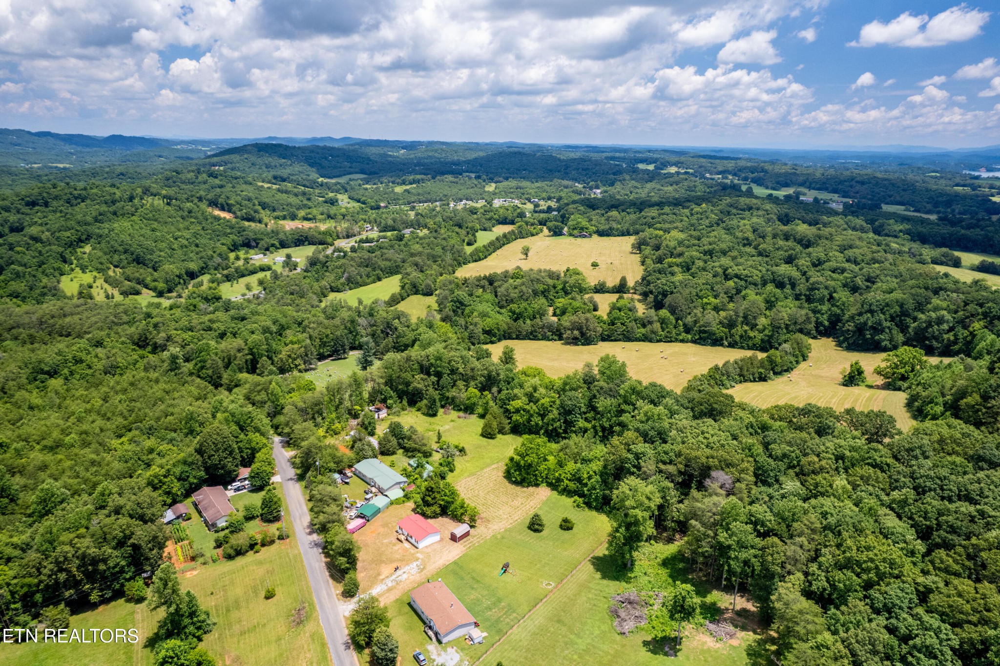 1768 Fain Cemetery Road Dandridge, TN 37725 - Photo 37 of 45 an aerial view of a houses with a yard