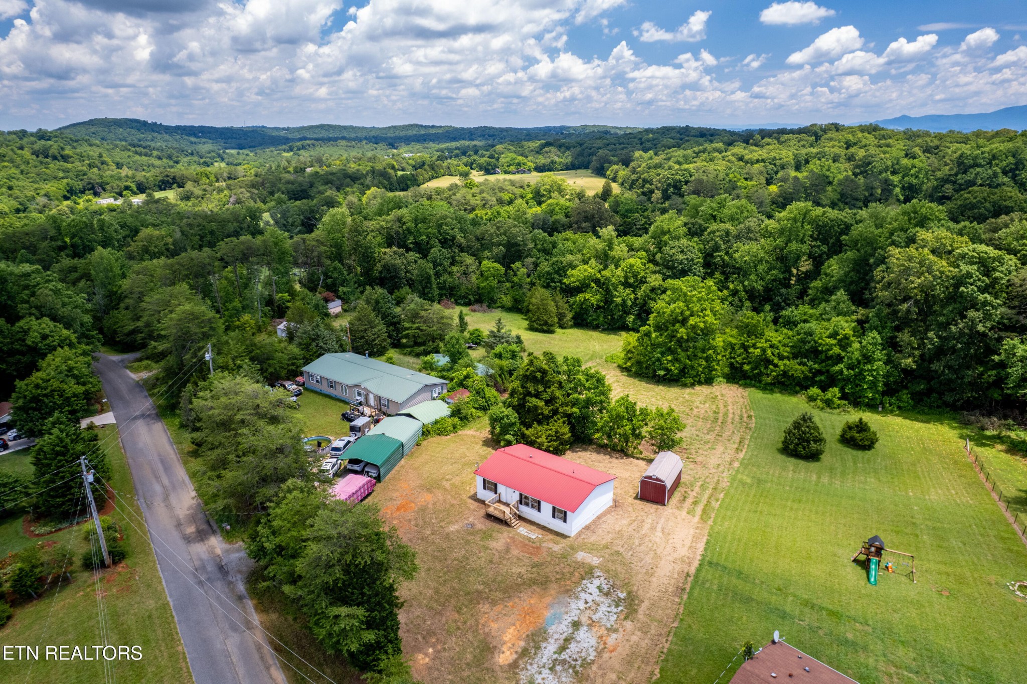 1768 Fain Cemetery Road Dandridge, TN 37725 - Photo 38 of 45 an aerial view of a house with a yard