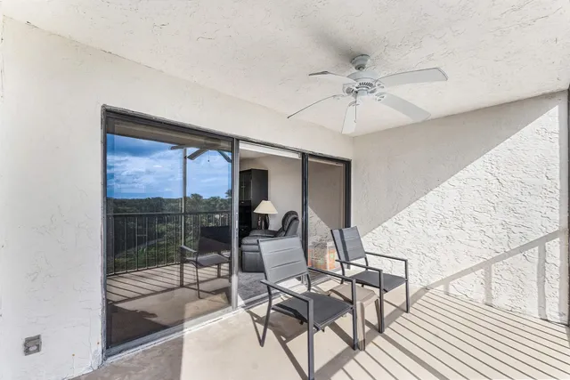 a view of a swimming pool with a garden