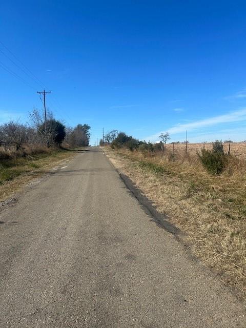 0 Vz County Road Ben Wheeler, TX 75754 - Photo 10 of 10 a view of a dry yard with wooden fence