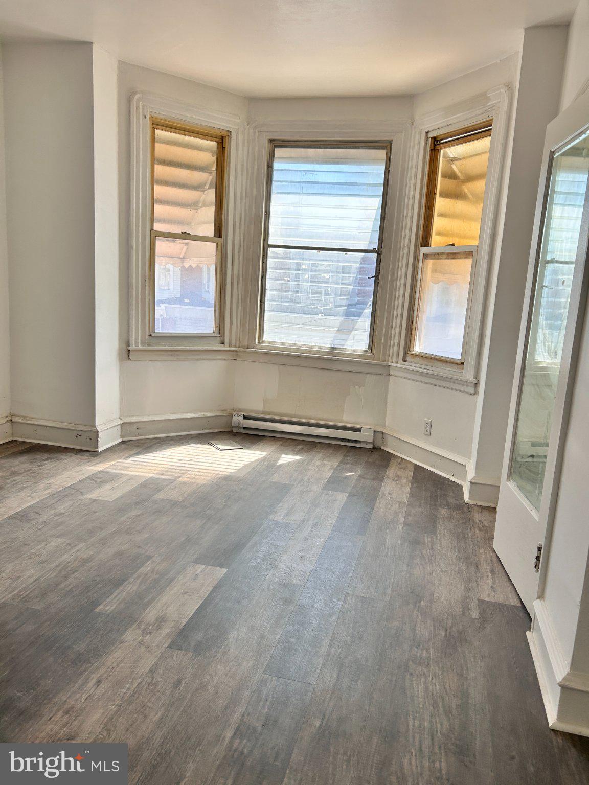 2019 Buckius Street Philadelphia, PA 19124 - Photo 5 of 9 Bright, airy space with bay windows.
