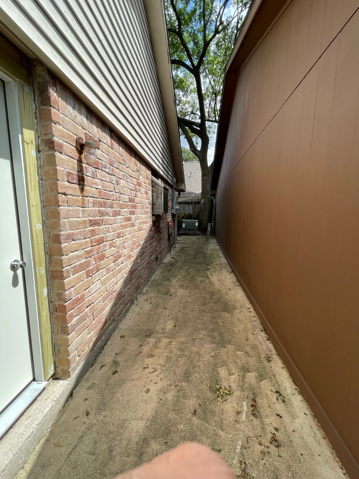 5003 Spring Forest Drive Houston, TX 77091 - Photo 11 of 37 a view of a yard with wooden fence and a large window