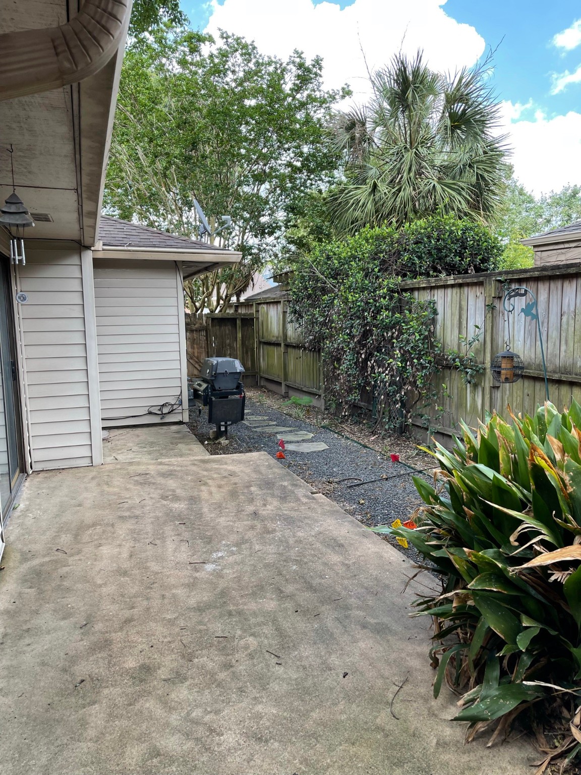 5003 Spring Forest Drive Houston, TX 77091 - Photo 14 of 37 a backyard of a house with table and chairs