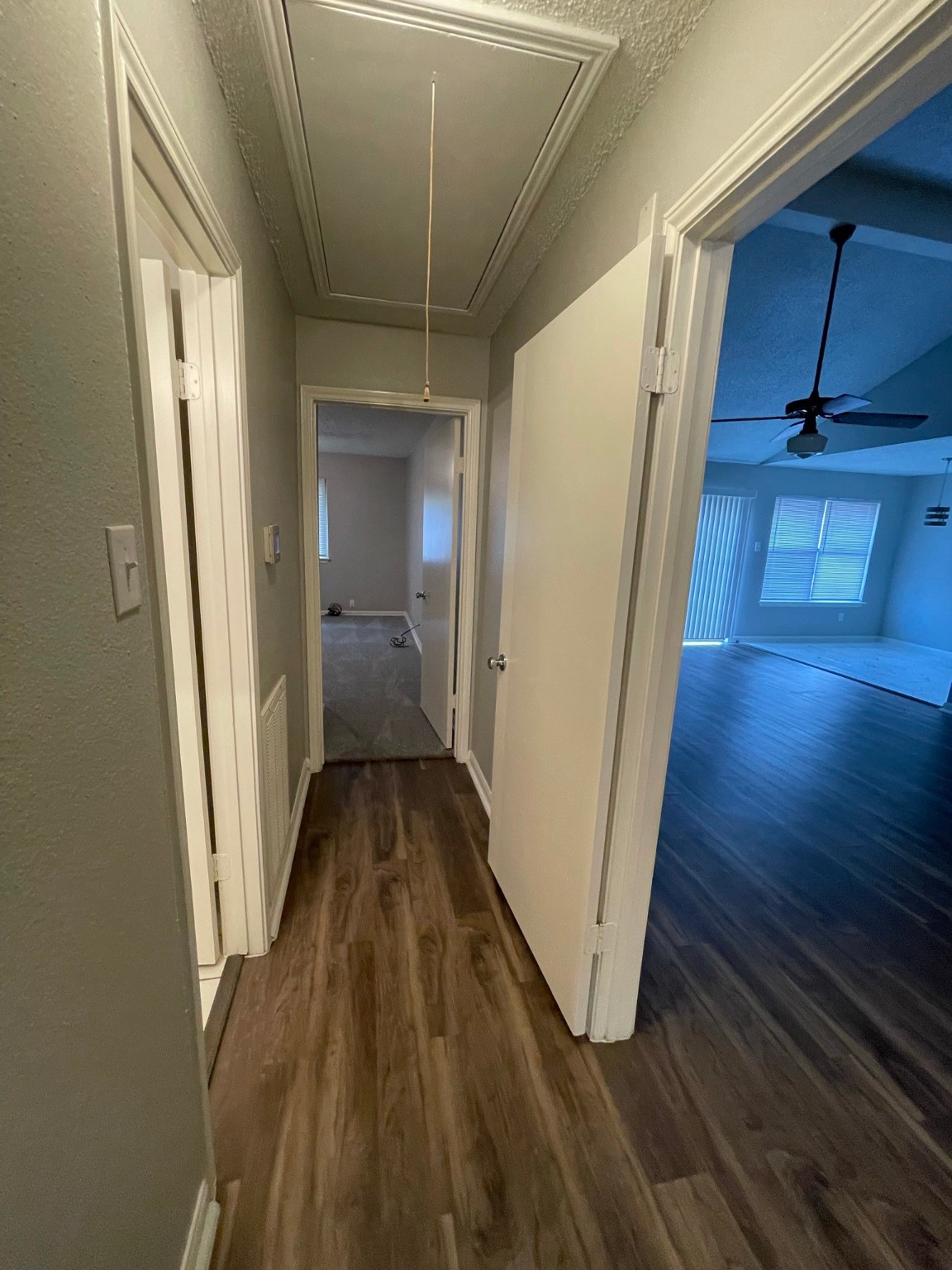 5003 Spring Forest Drive Houston, TX 77091 - Photo 22 of 37 a view of a hallway with wooden floor and staircase