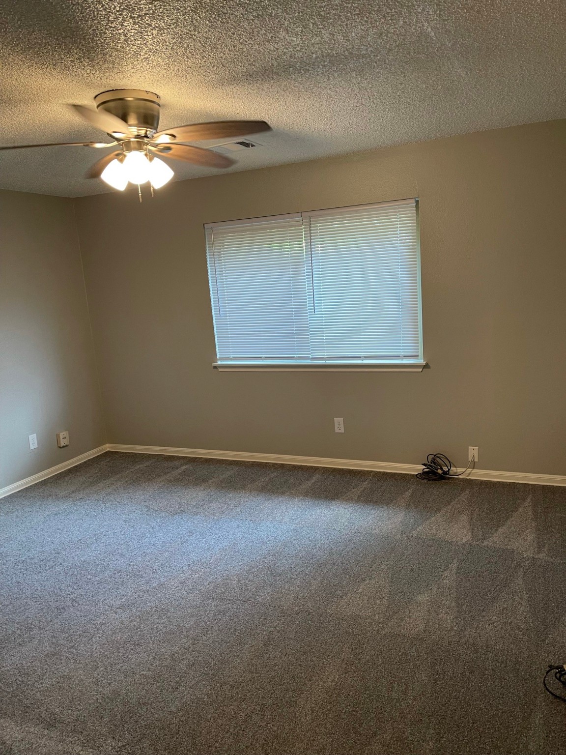 5003 Spring Forest Drive Houston, TX 77091 - Photo 24 of 37 a view of a chandelier fan and wooden floor