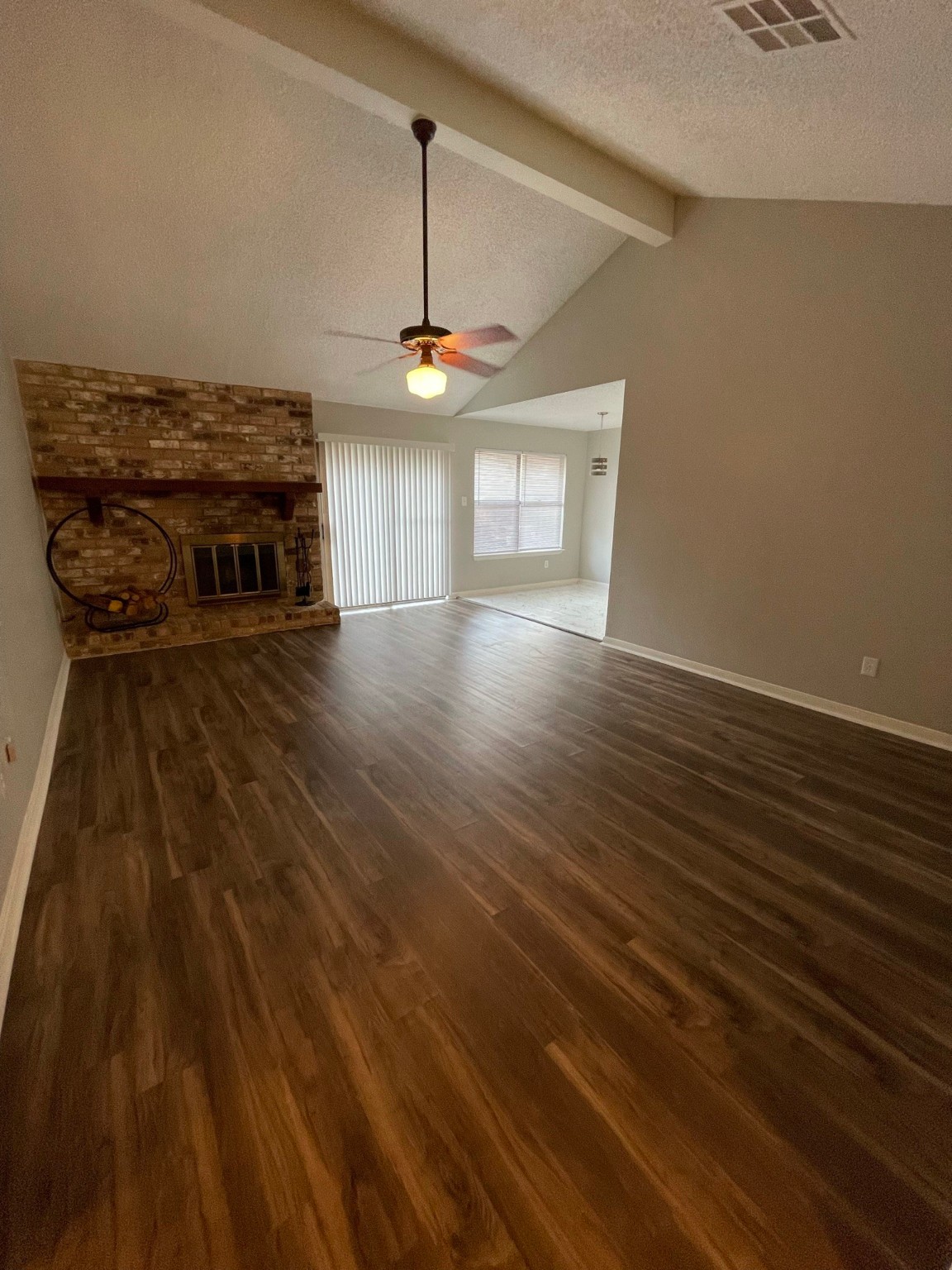 5003 Spring Forest Drive Houston, TX 77091 - Photo 29 of 37 a view of a room with wooden floor fireplace and windows