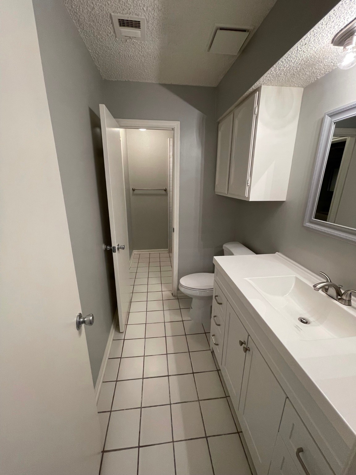5003 Spring Forest Drive Houston, TX 77091 - Photo 8 of 37 a bathroom with a sink and a mirror